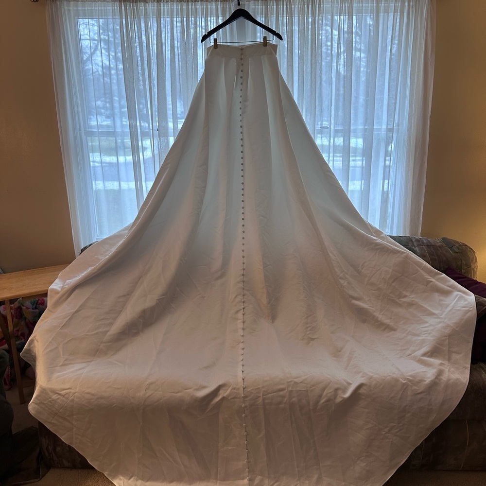 White bridal overskirt with cathedral train